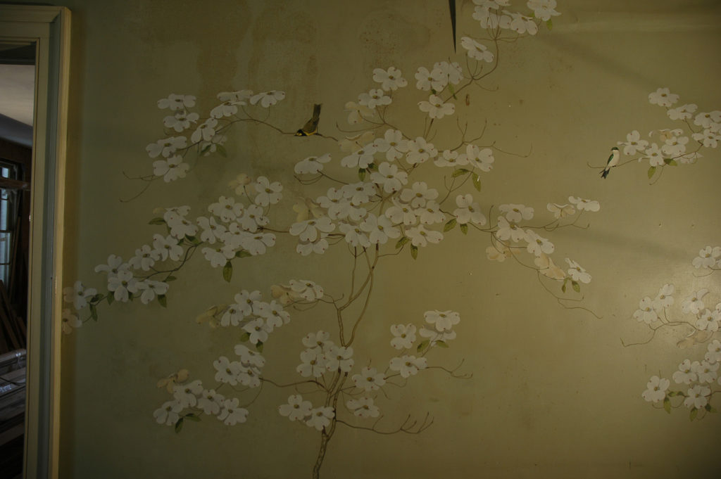 damaged wallpaper with flowering dogwood image